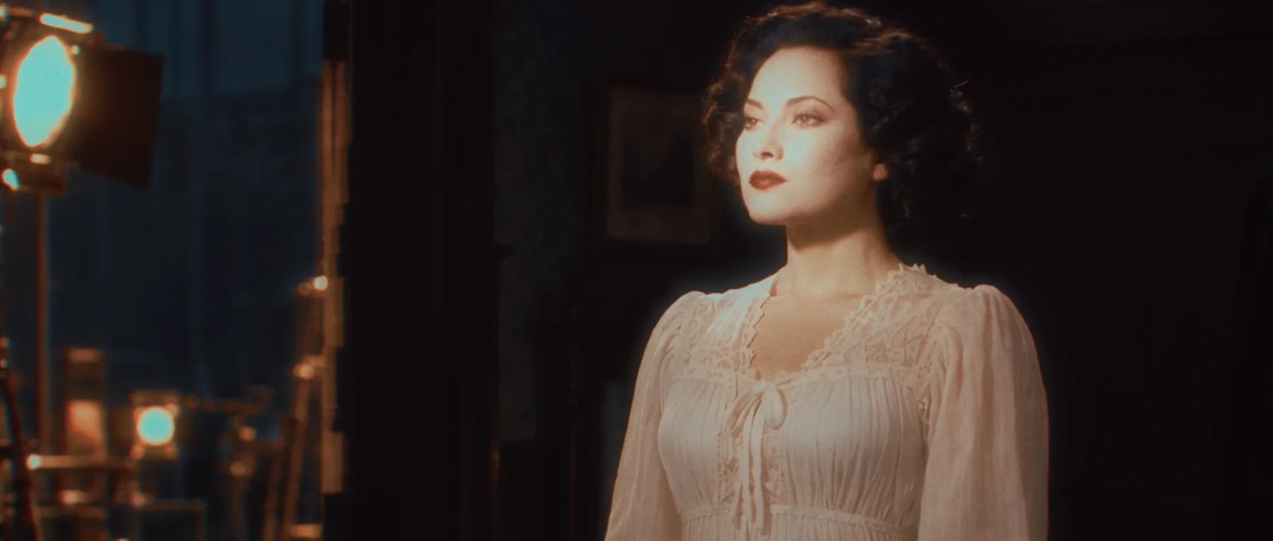 A 1940s Hollywood soundstage illuminated by a large Fresnel lamp
